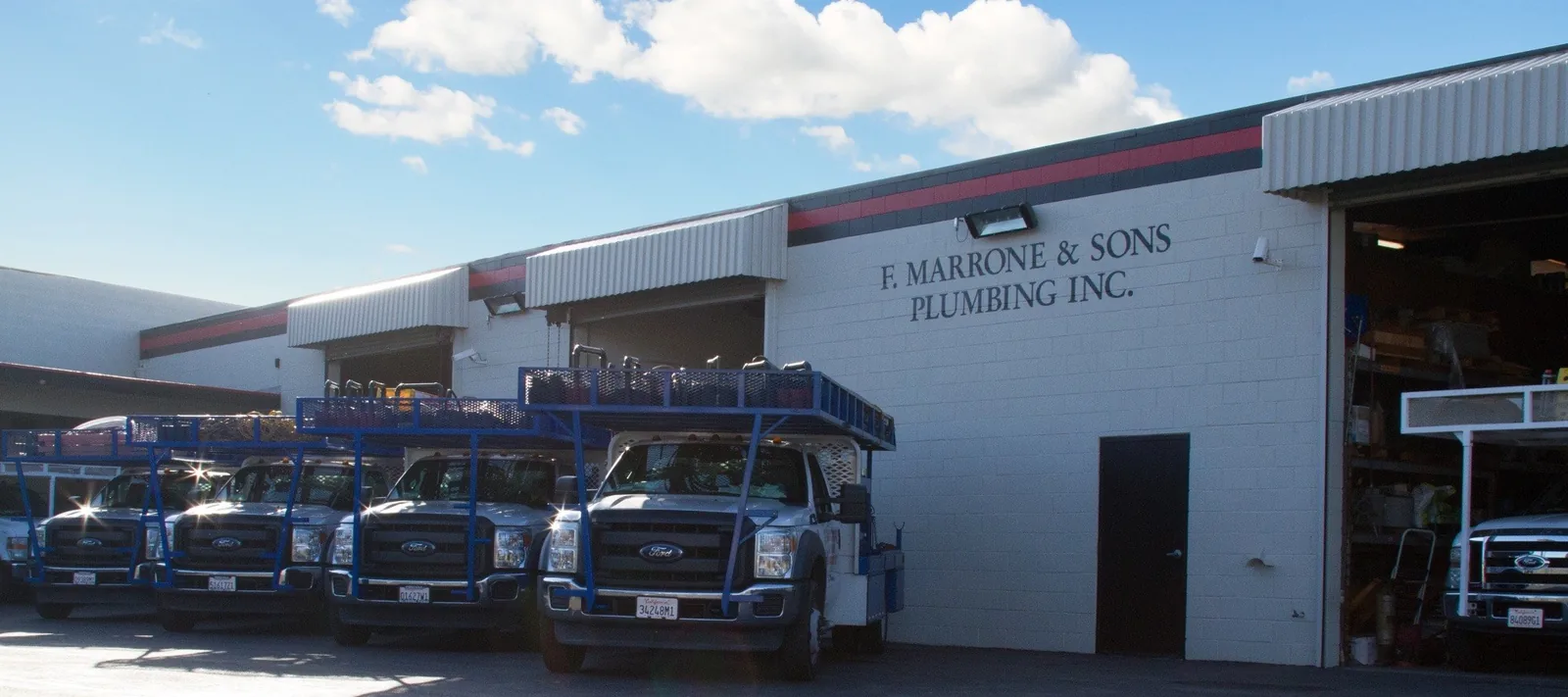 Frank Marrone and Sons Plumbing service fleet outside the El Monte shop